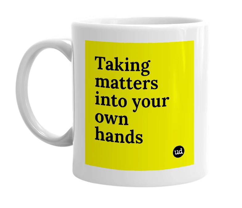 White mug with 'Taking matters into your own hands' in bold black letters