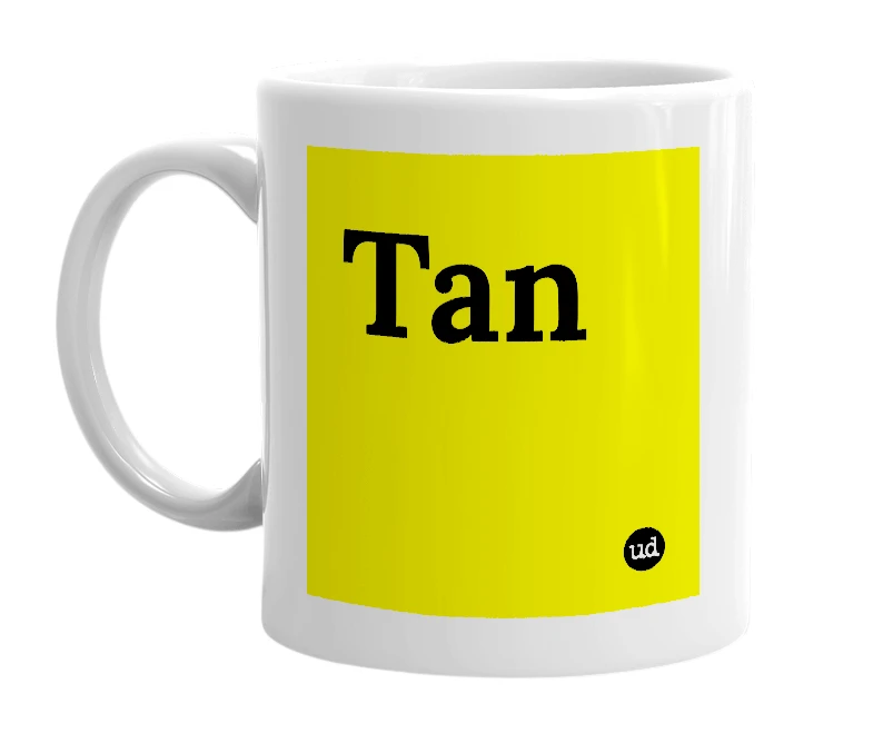 White mug with 'Tan' in bold black letters