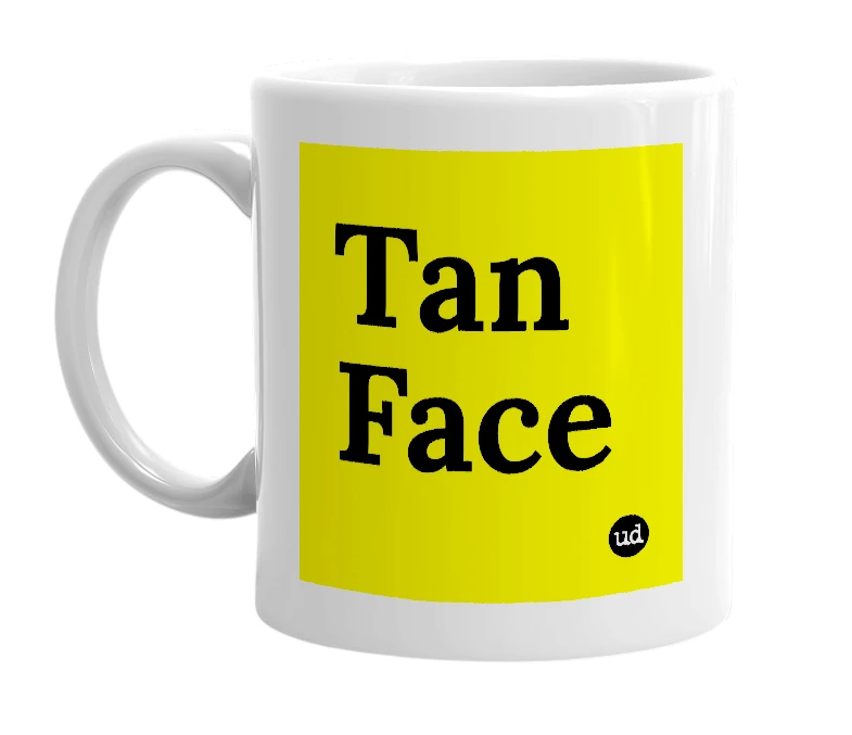 White mug with 'Tan Face' in bold black letters