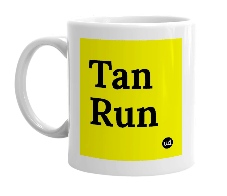 White mug with 'Tan Run' in bold black letters