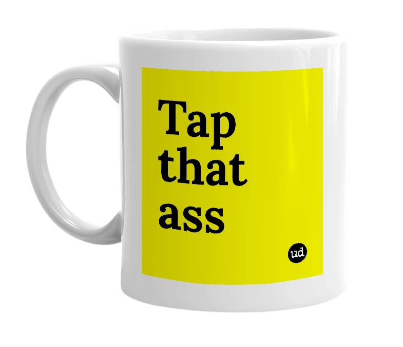 White mug with 'Tap that ass' in bold black letters