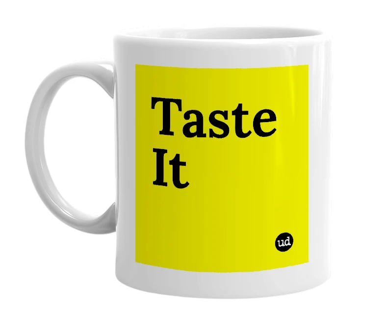 White mug with 'Taste It' in bold black letters