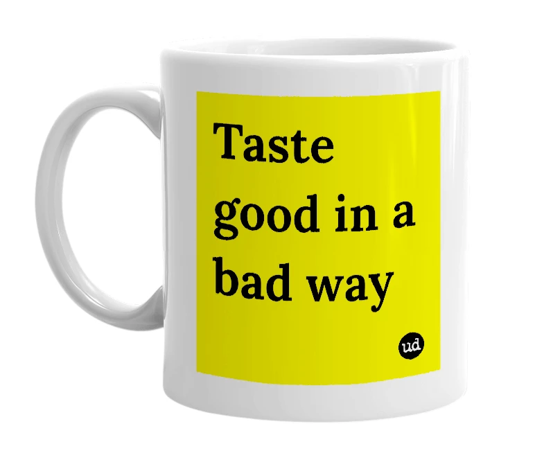 White mug with 'Taste good in a bad way' in bold black letters