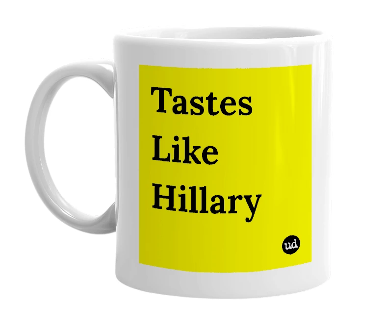 White mug with 'Tastes Like Hillary' in bold black letters