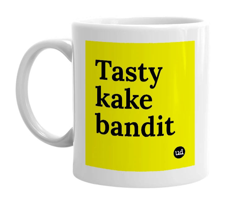 White mug with 'Tasty kake bandit' in bold black letters