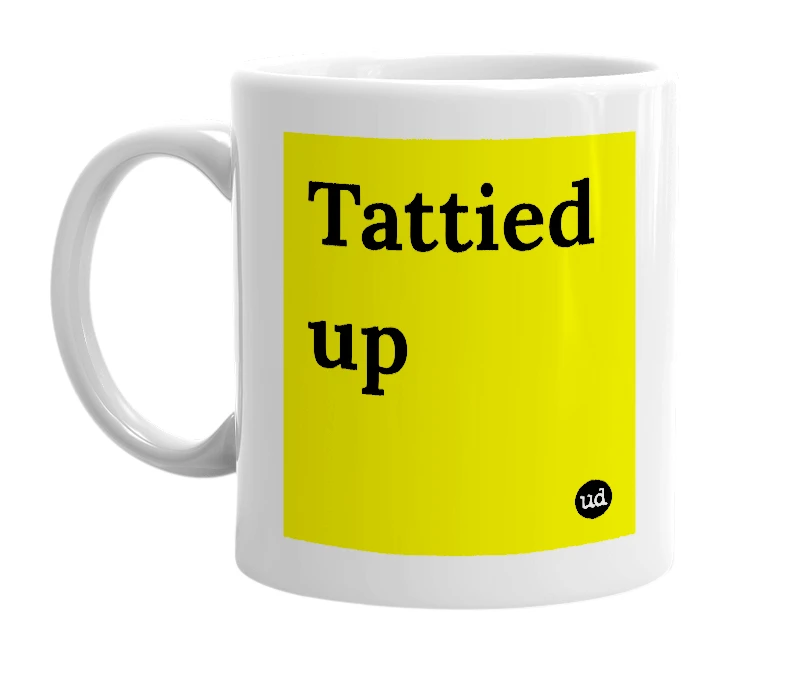White mug with 'Tattied up' in bold black letters