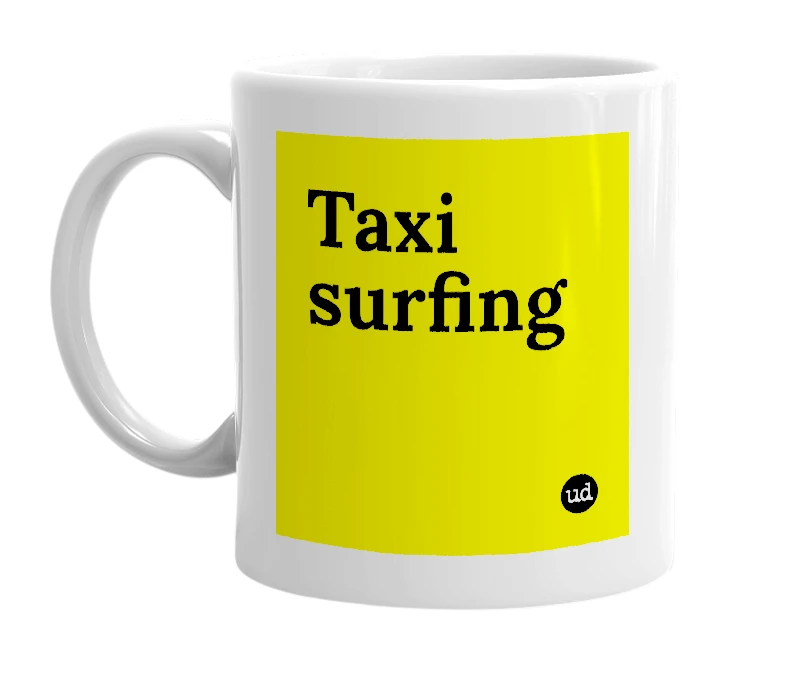 White mug with 'Taxi surfing' in bold black letters