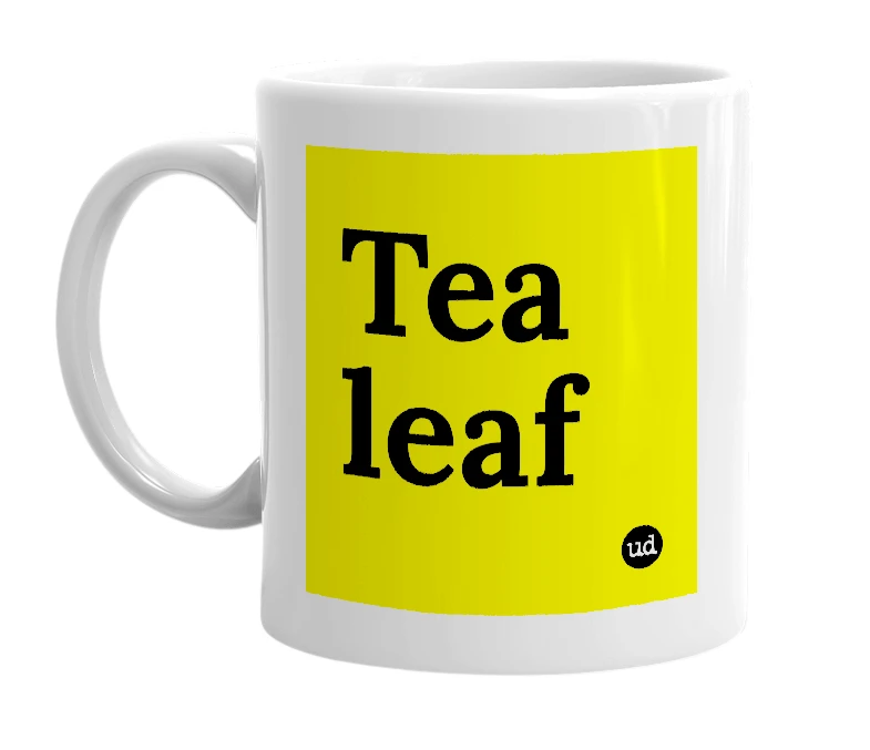 White mug with 'Tea leaf' in bold black letters