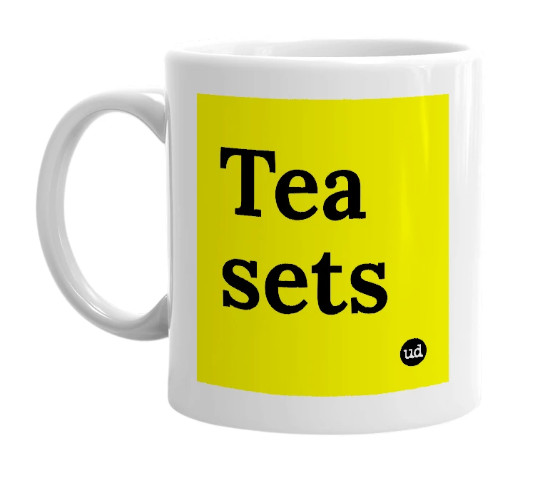 White mug with 'Tea sets' in bold black letters