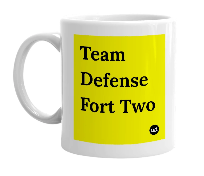 White mug with 'Team Defense Fort Two' in bold black letters