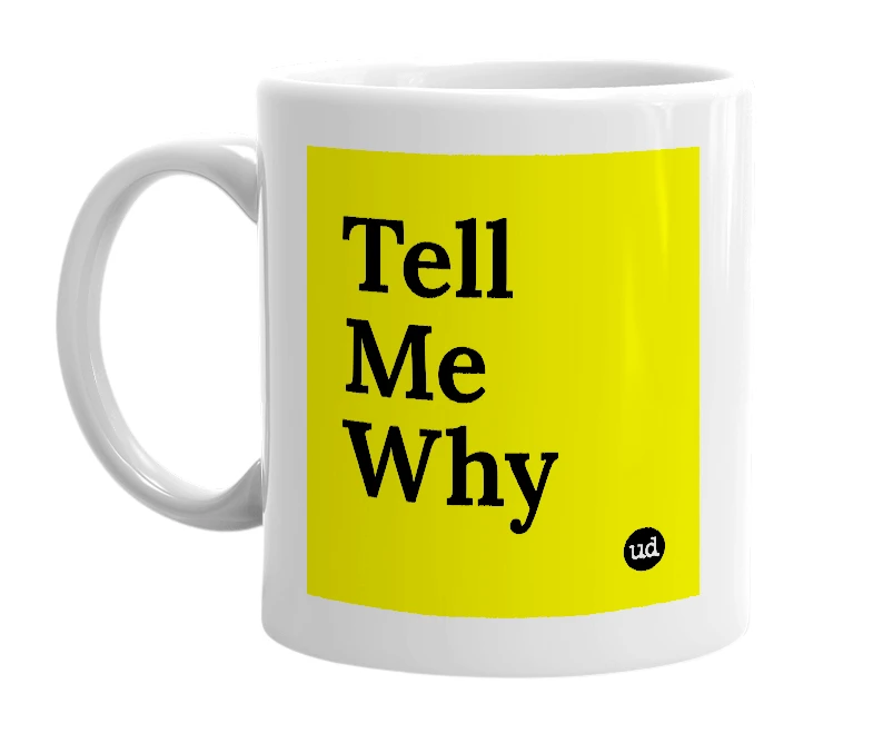 White mug with 'Tell Me Why' in bold black letters