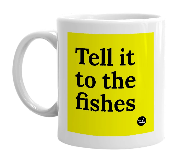 White mug with 'Tell it to the fishes' in bold black letters