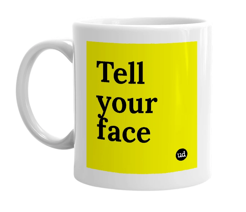 White mug with 'Tell your face' in bold black letters