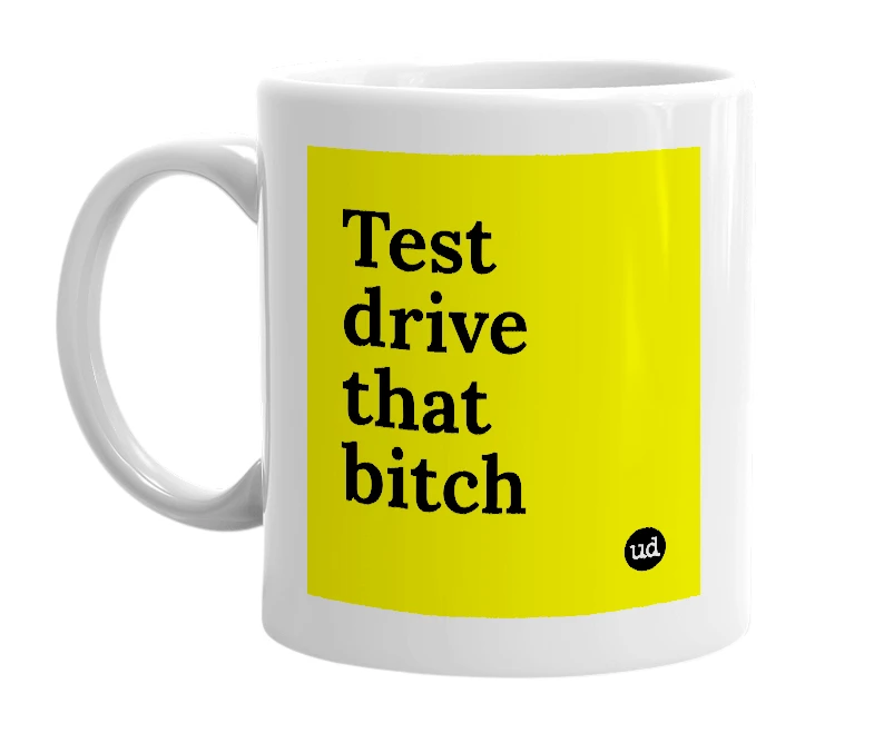 White mug with 'Test drive that bitch' in bold black letters
