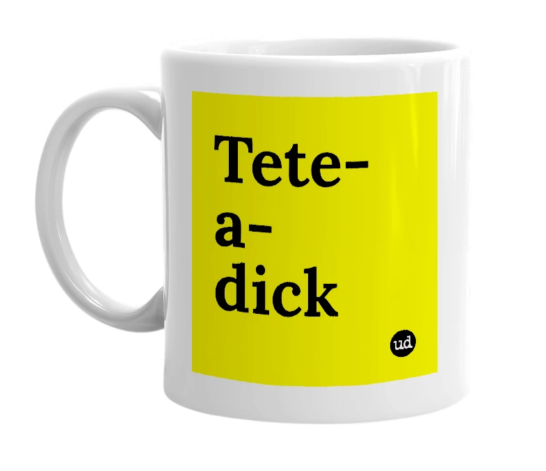 White mug with 'Tete-a-dick' in bold black letters