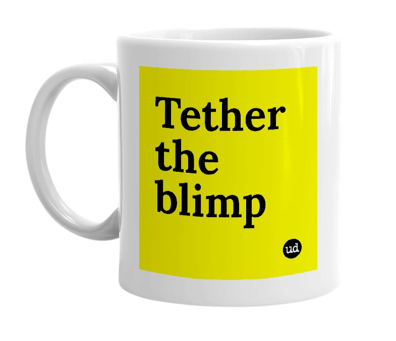 White mug with 'Tether the blimp' in bold black letters