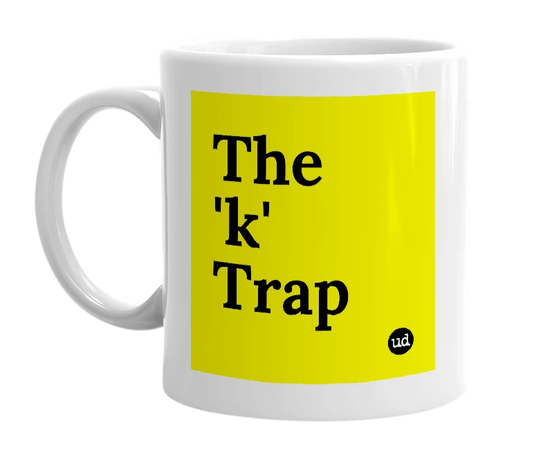 White mug with 'The 'k' Trap' in bold black letters