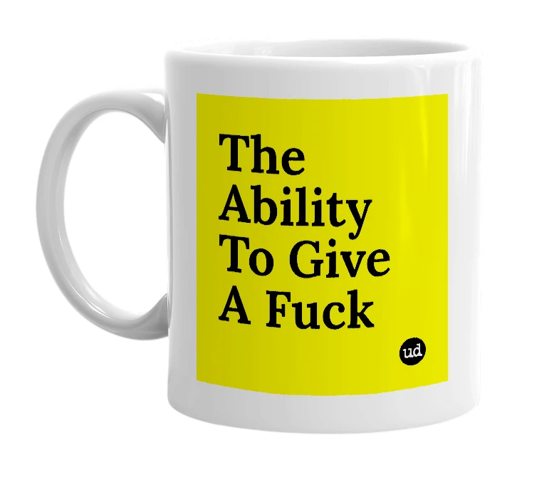 White mug with 'The Ability To Give A Fuck' in bold black letters