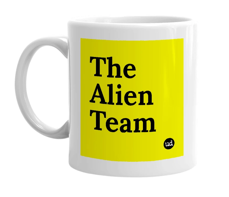 White mug with 'The Alien Team' in bold black letters