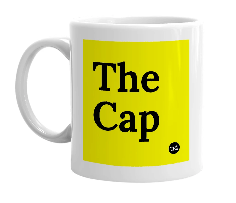 White mug with 'The Cap' in bold black letters