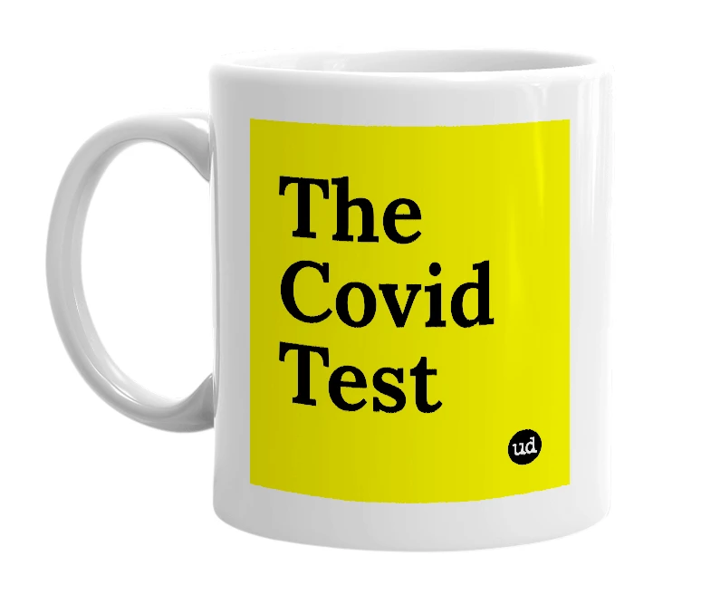 White mug with 'The Covid Test' in bold black letters