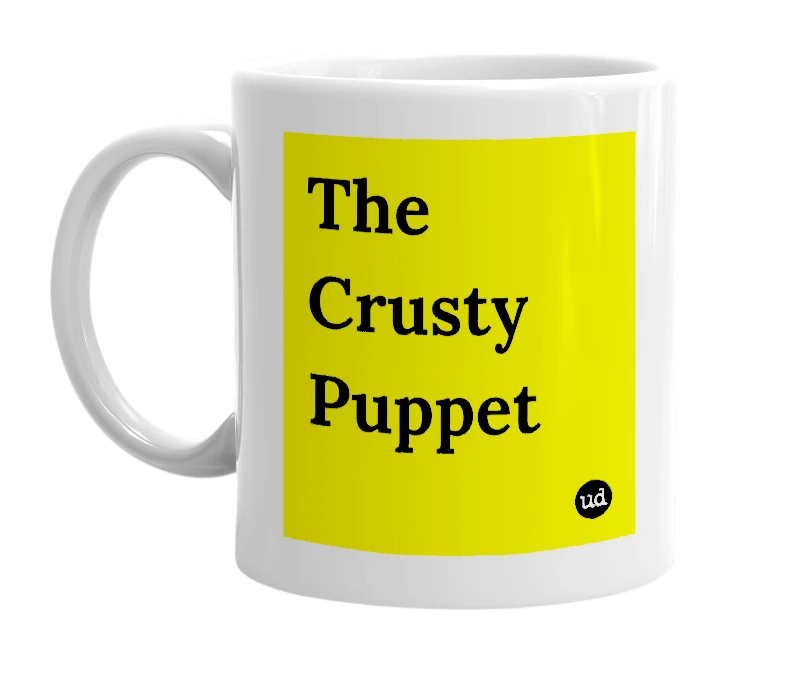 White mug with 'The Crusty Puppet' in bold black letters
