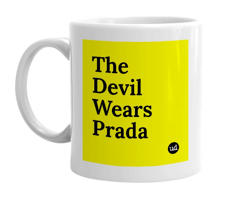 White mug with 'The Devil Wears Prada' in bold black letters