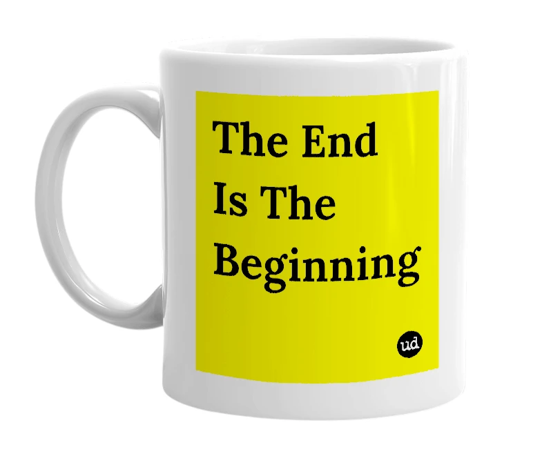 White mug with 'The End Is The Beginning' in bold black letters