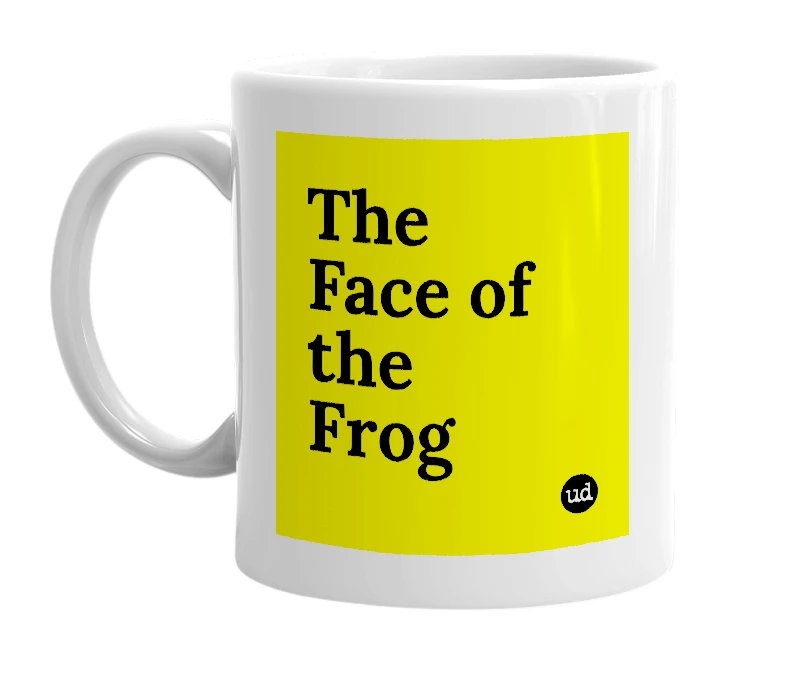 White mug with 'The Face of the Frog' in bold black letters