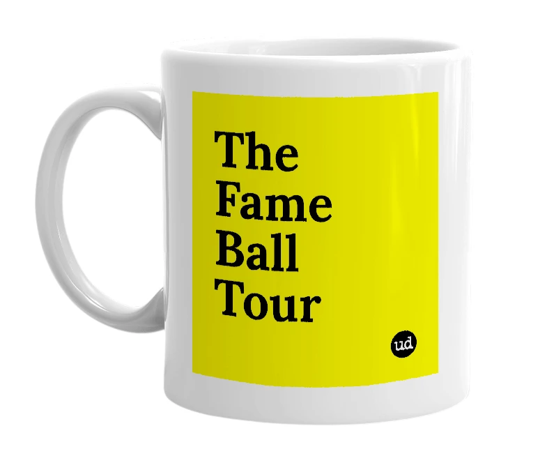 White mug with 'The Fame Ball Tour' in bold black letters