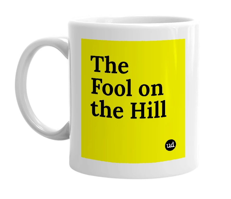 White mug with 'The Fool on the Hill' in bold black letters