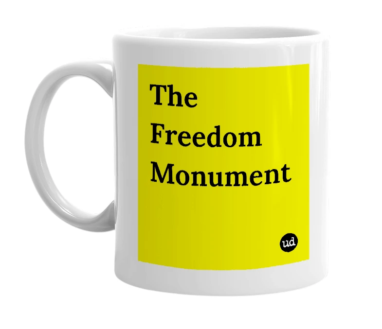 White mug with 'The Freedom Monument' in bold black letters