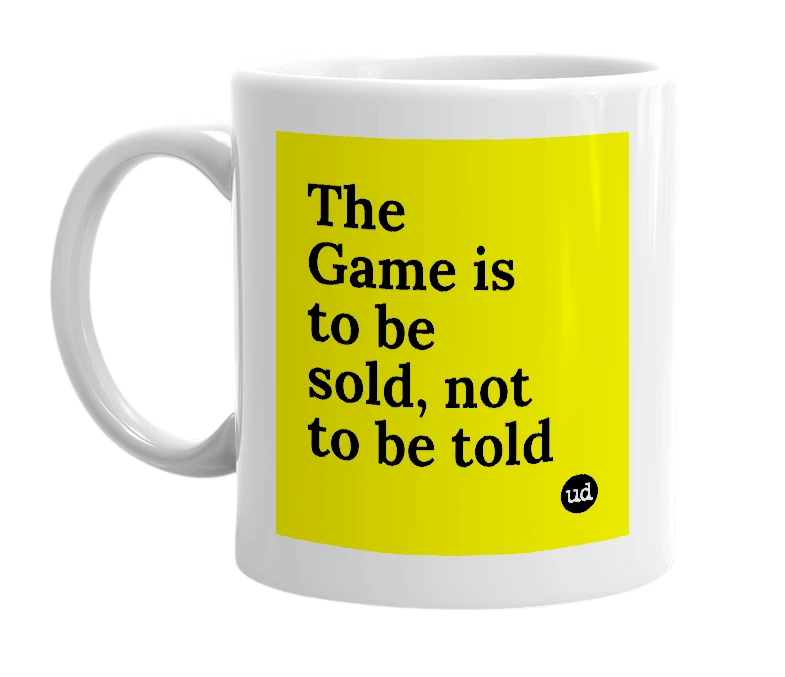 White mug with 'The Game is to be sold, not to be told' in bold black letters