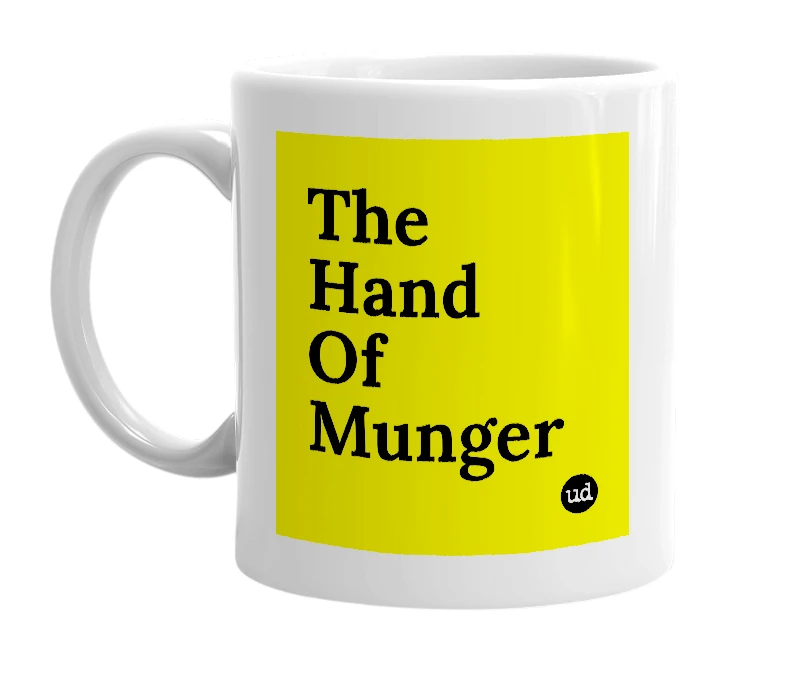 White mug with 'The Hand Of Munger' in bold black letters