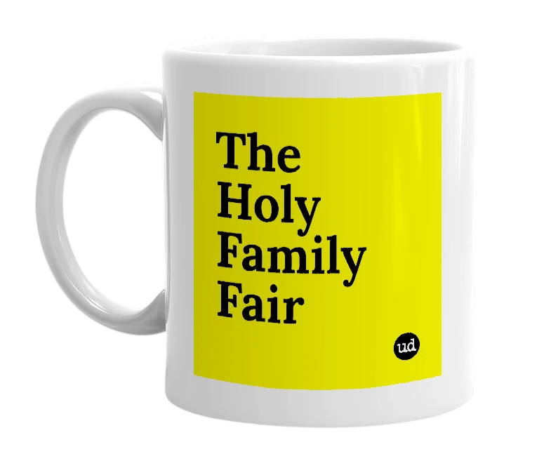 White mug with 'The Holy Family Fair' in bold black letters
