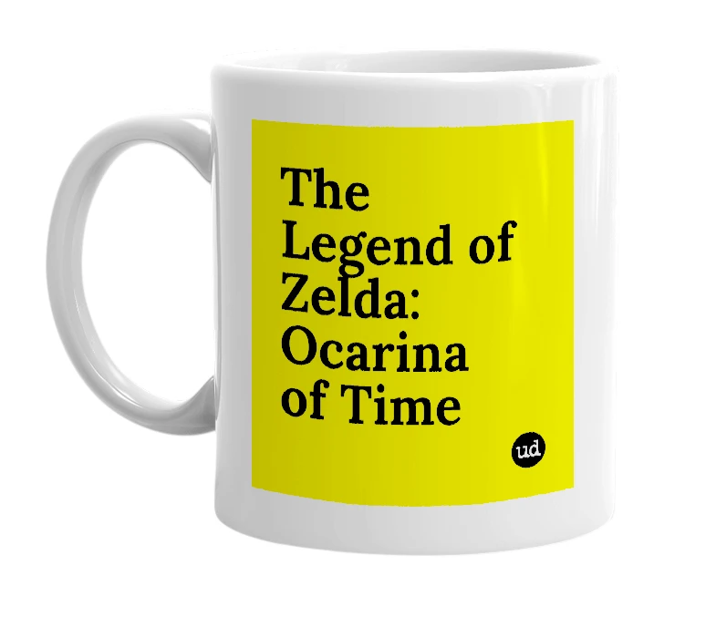 White mug with 'The Legend of Zelda: Ocarina of Time' in bold black letters