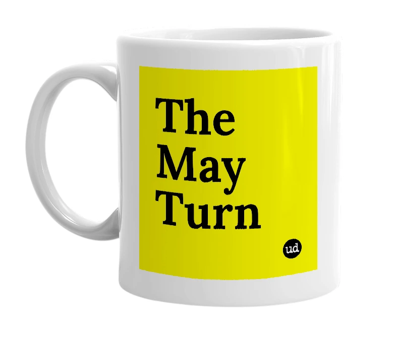 White mug with 'The May Turn' in bold black letters