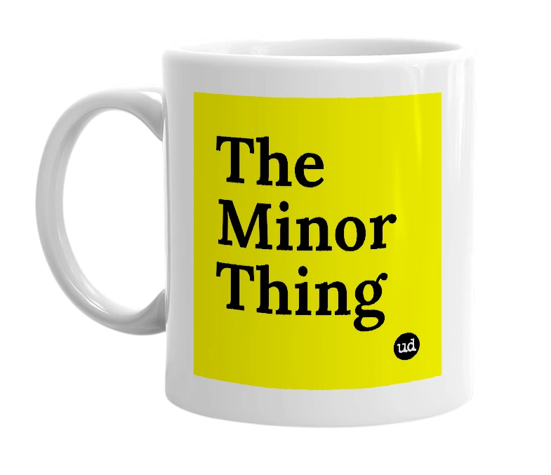 White mug with 'The Minor Thing' in bold black letters