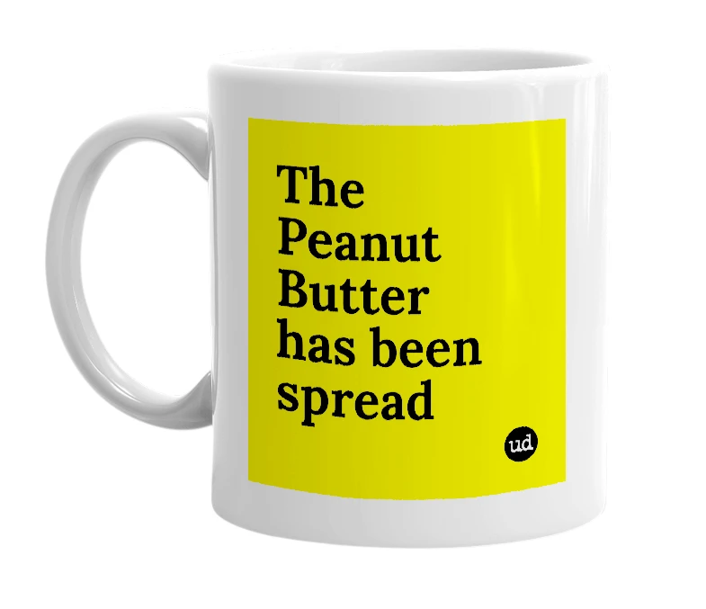 White mug with 'The Peanut Butter has been spread' in bold black letters