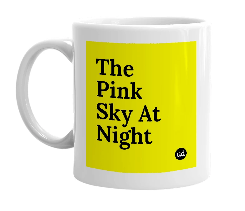 White mug with 'The Pink Sky At Night' in bold black letters