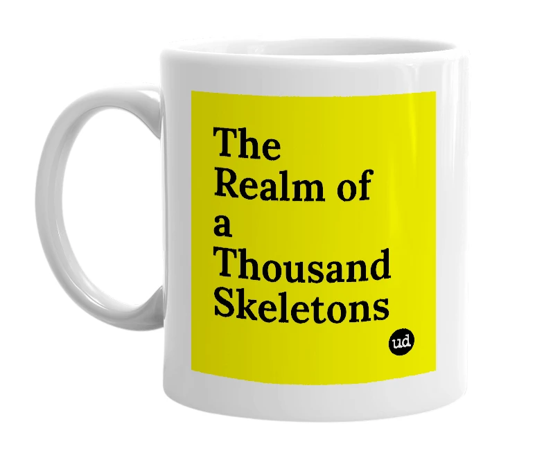 White mug with 'The Realm of a Thousand Skeletons' in bold black letters