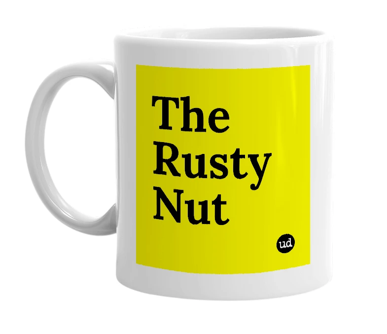 White mug with 'The Rusty Nut' in bold black letters