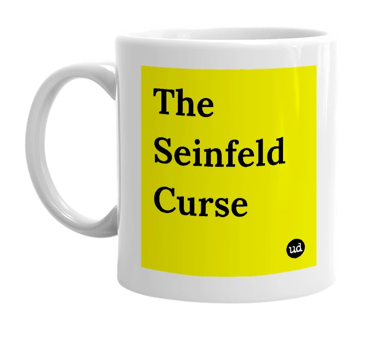 White mug with 'The Seinfeld Curse' in bold black letters