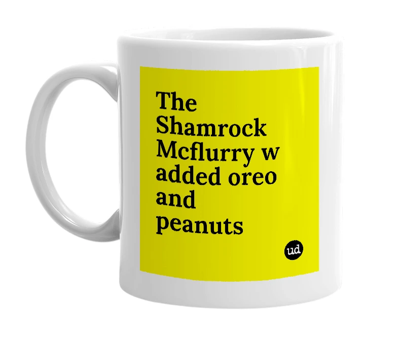 White mug with 'The Shamrock Mcflurry w added oreo and peanuts' in bold black letters