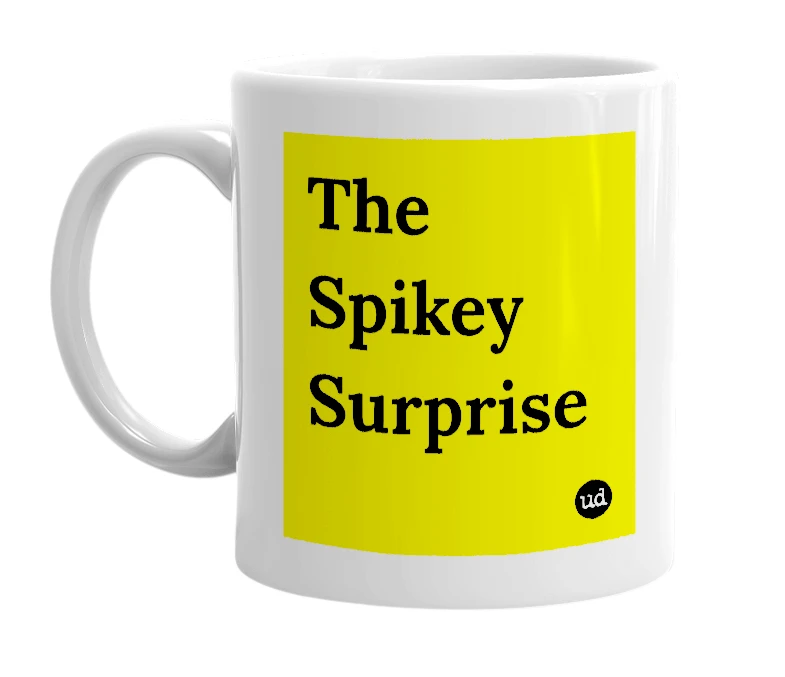 White mug with 'The Spikey Surprise' in bold black letters