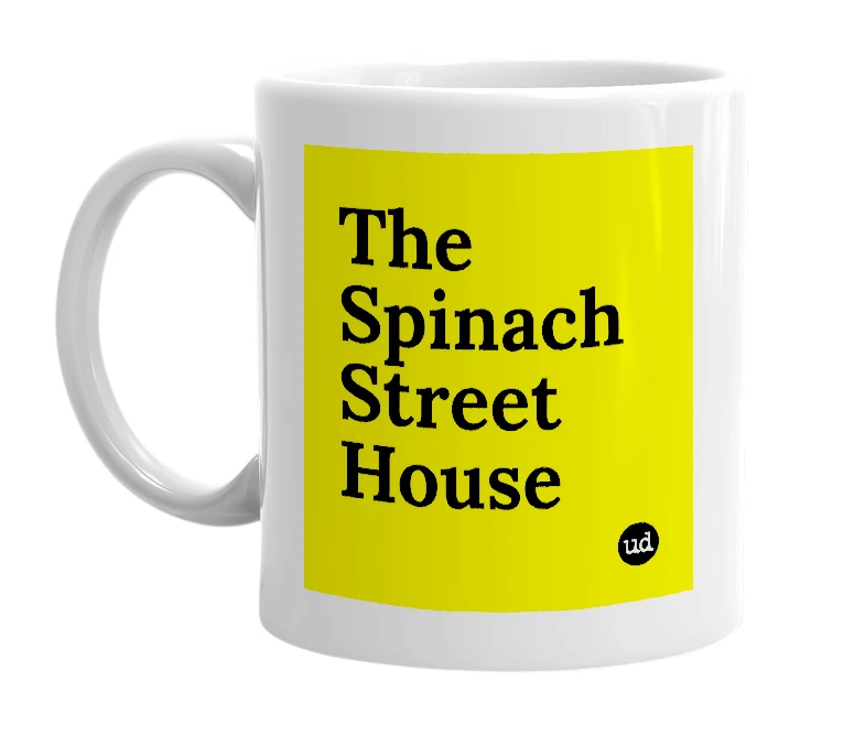 White mug with 'The Spinach Street House' in bold black letters