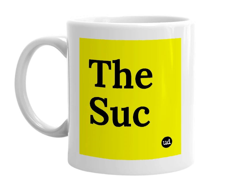 White mug with 'The Suc' in bold black letters