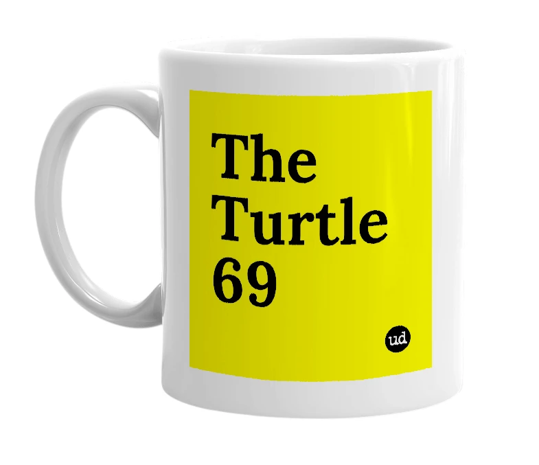 White mug with 'The Turtle 69' in bold black letters