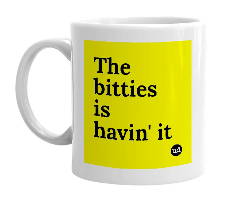 White mug with 'The bitties is havin' it' in bold black letters