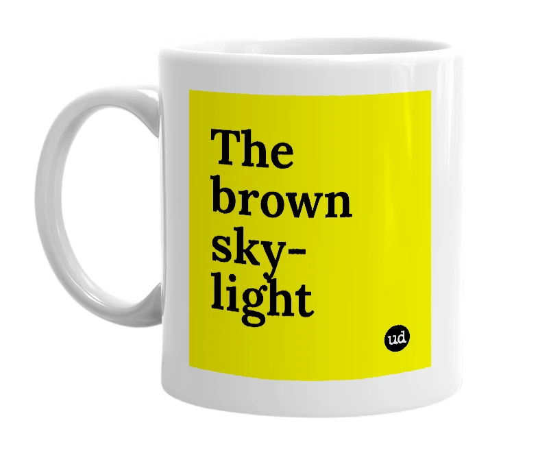 White mug with 'The brown sky-light' in bold black letters